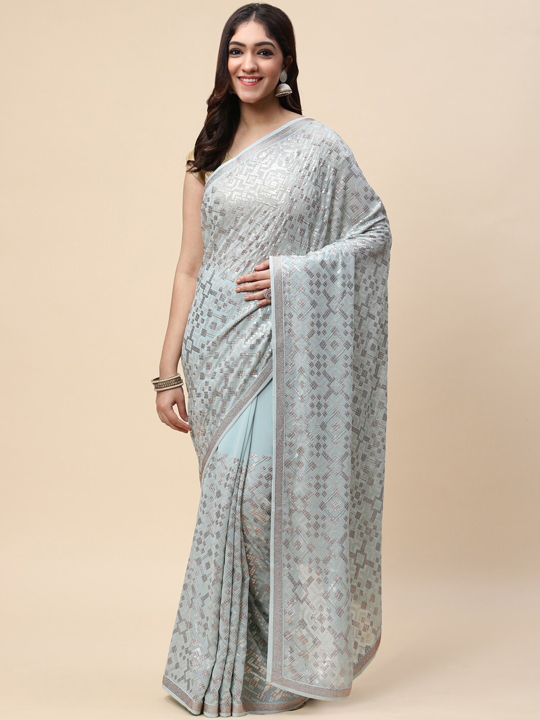 

Meena Bazaar Sea Green & Silver-Toned Embellished Poly Georgette Saree