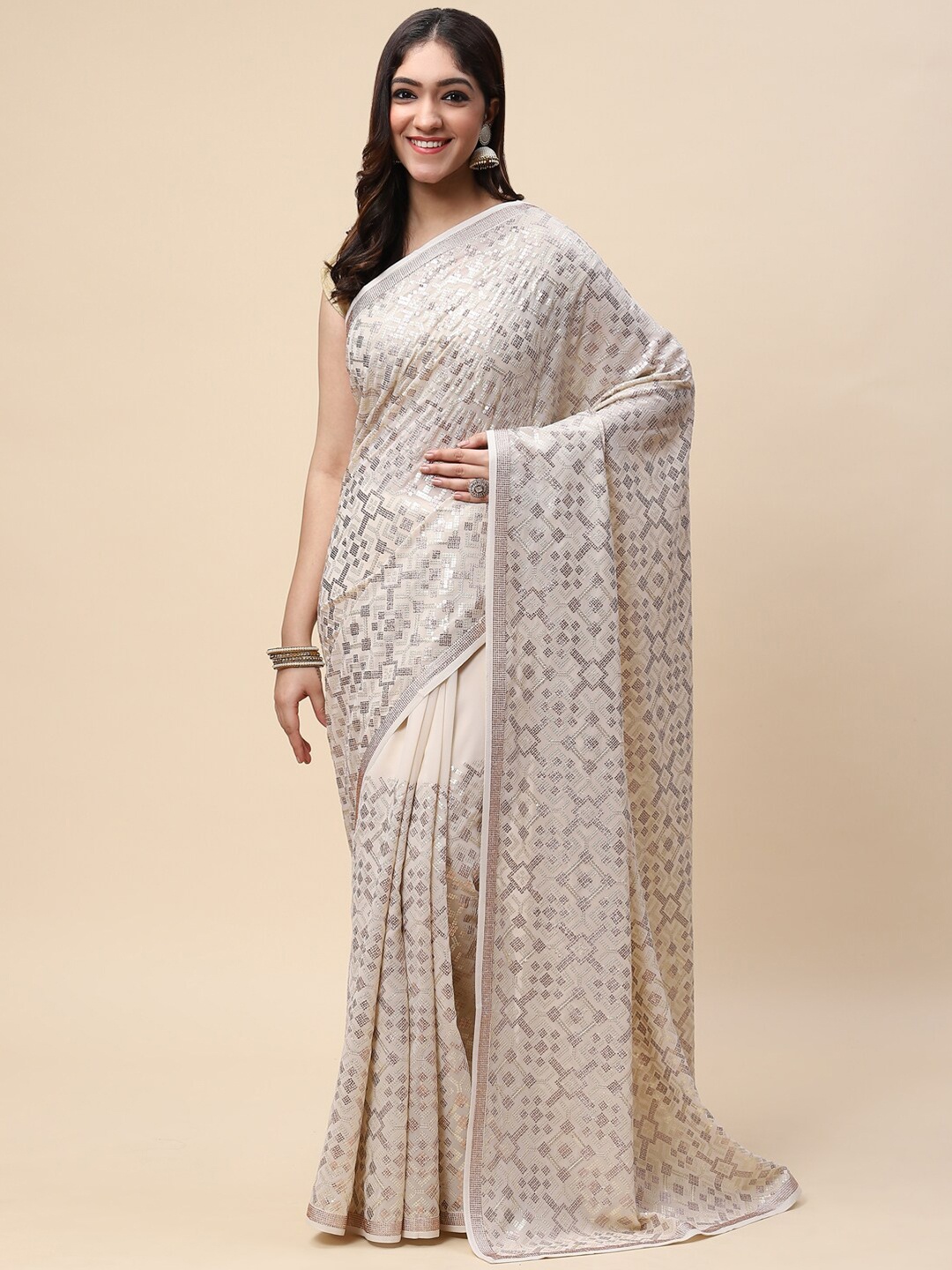 

Meena Bazaar Beige & Silver-Toned Embellished Sequinned Saree