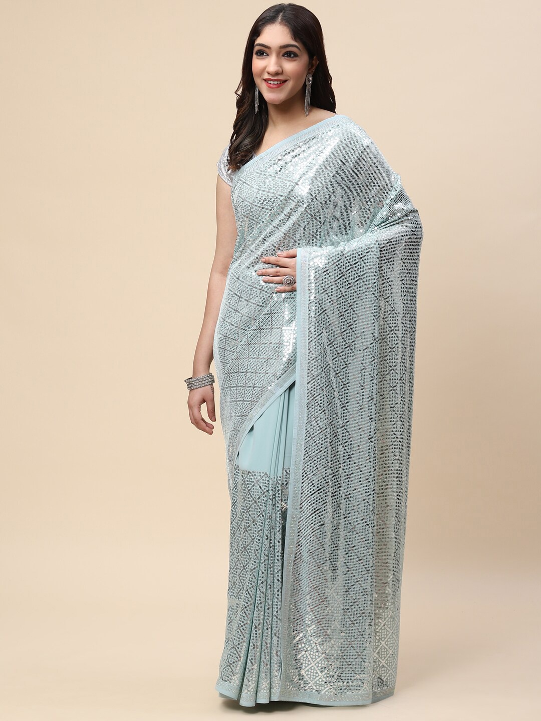 

Meena Bazaar Sea Green & Silver-Toned Embellished Sequinned Saree