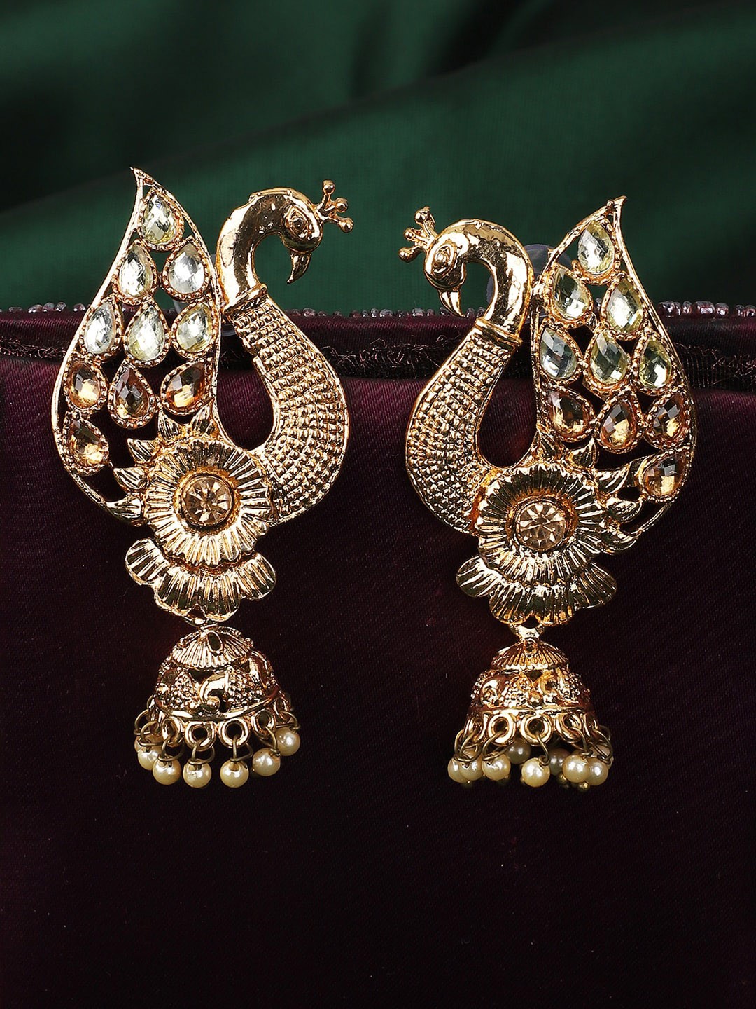 

ANIKAS CREATION Gold-Plated Contemporary Jhumkas Earrings