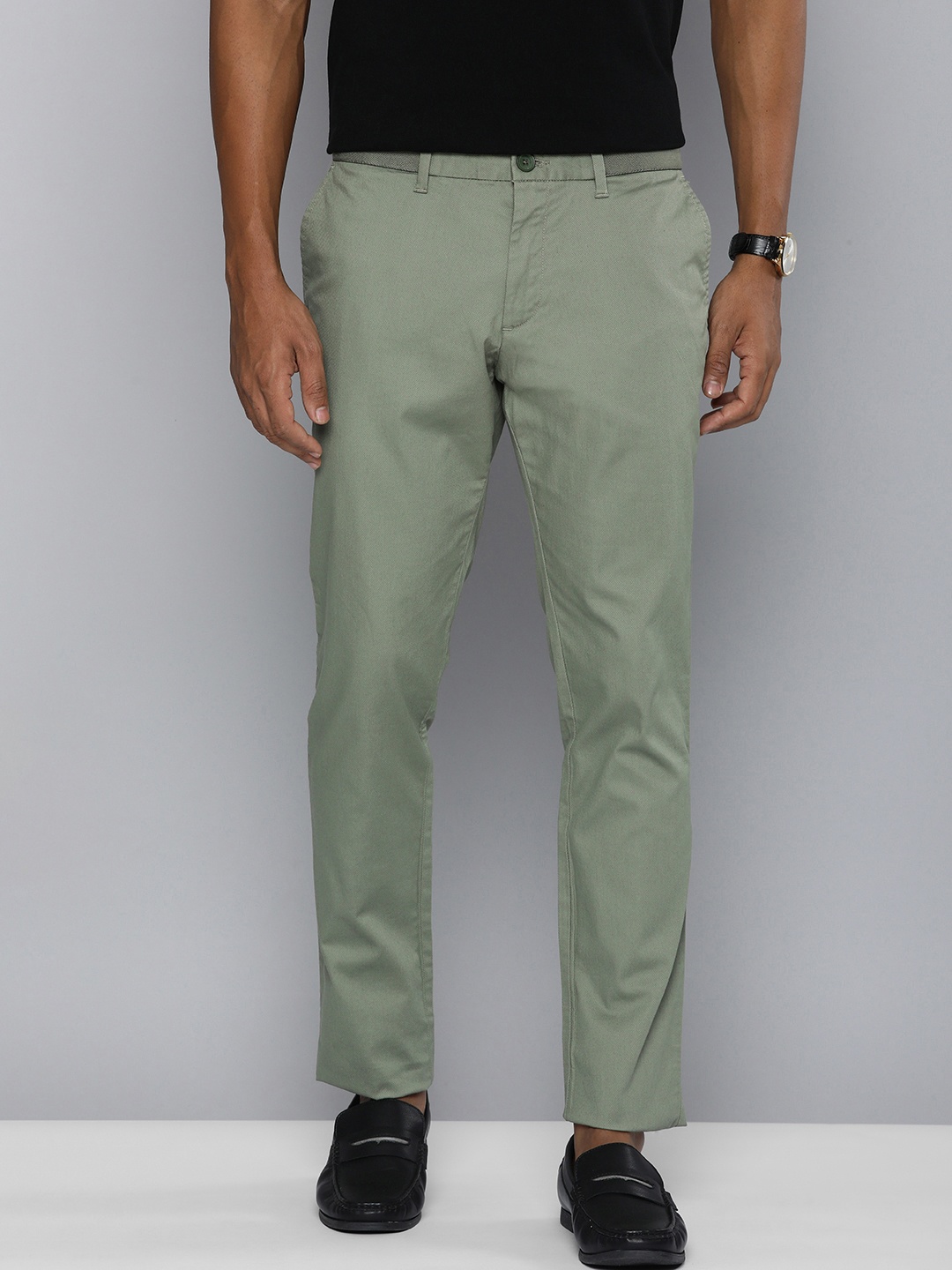 

Indian Terrain Men Self Design Textured Brooklyn Slim Fit Trousers, Green