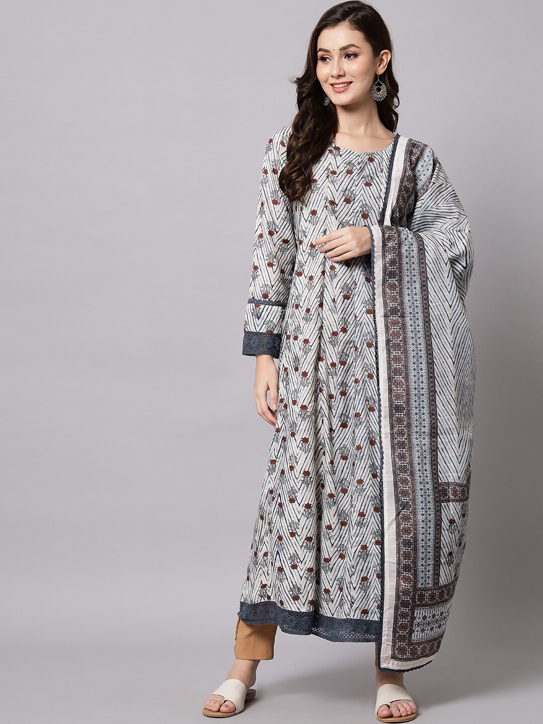 

Silai Bunai Women White Floral Printed Panelled Sequinned Kurta with Trousers & With Dupatta