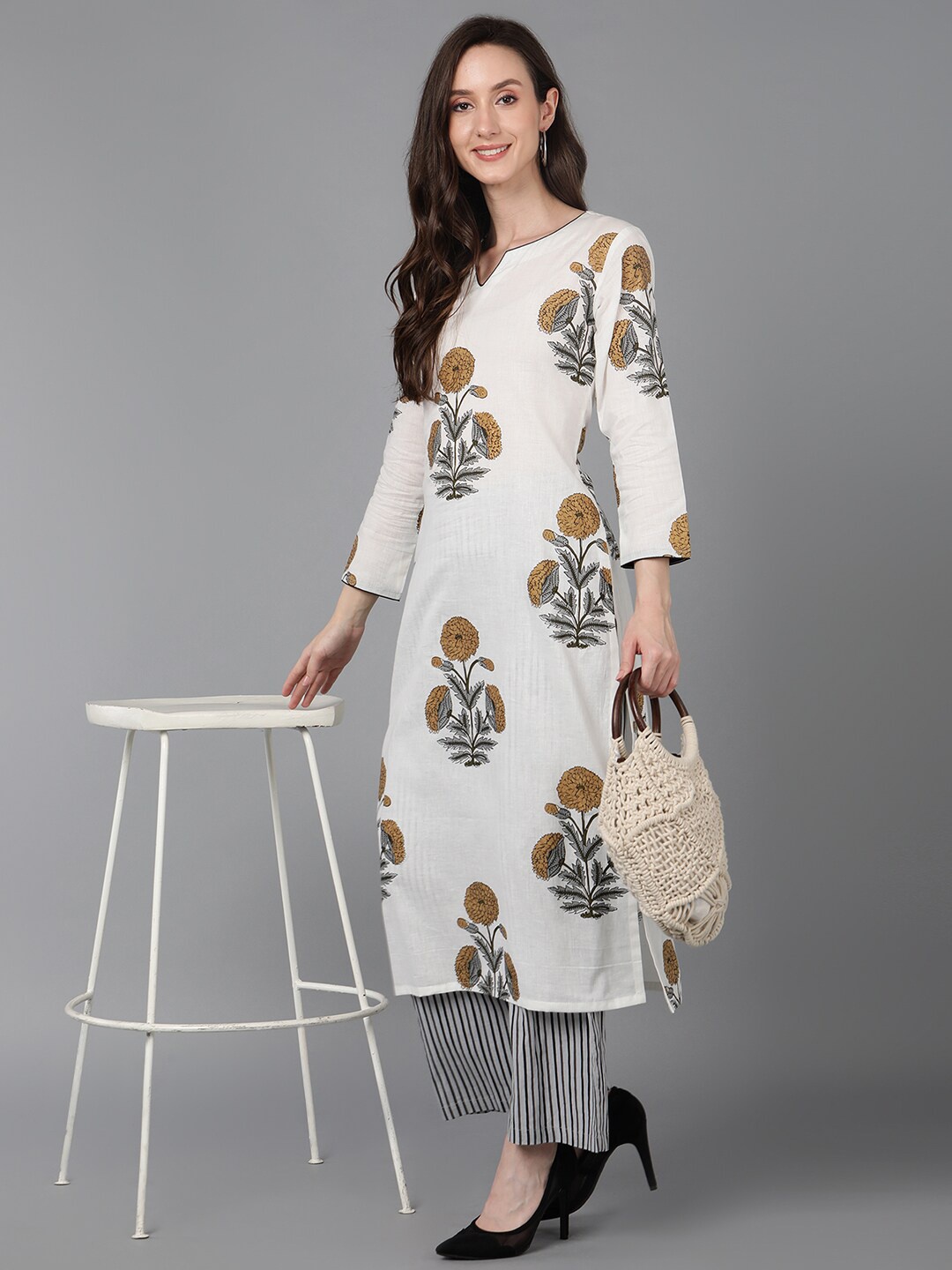 

AHIKA Women White Floral Printed Pure Cotton Kurta with Palazzo Set