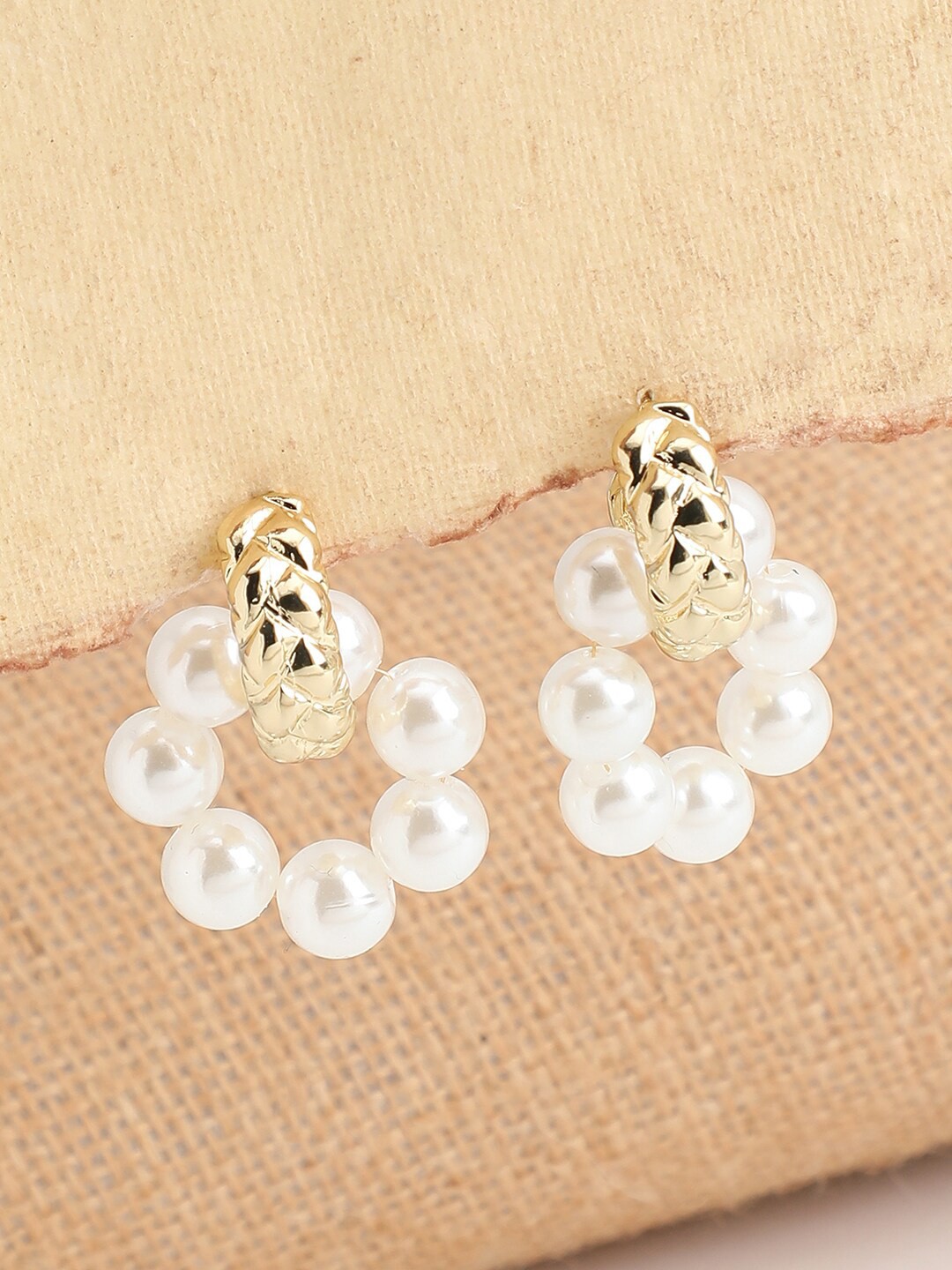 

SOHI Women Gold-Toned & White Contemporary Studs Earrings