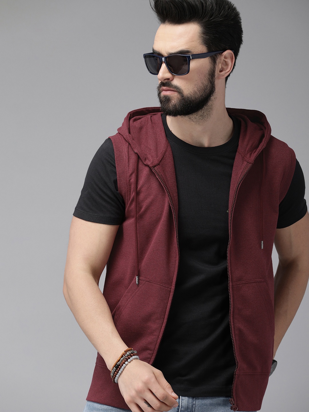 

Roadster Men Burgundy Solid Hooded Sweatshirt