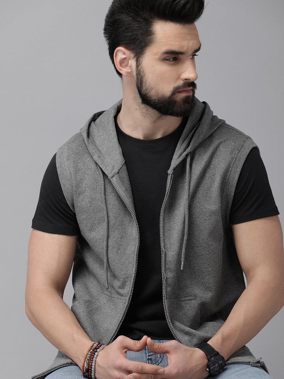 

Roadster Men Charcoal Solid Hooded Sweatshirt