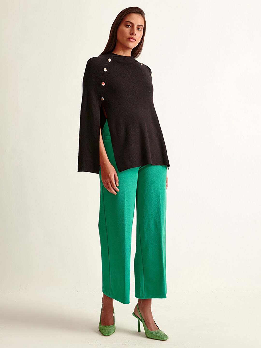 

COVER STORY Women Black Solid Poncho