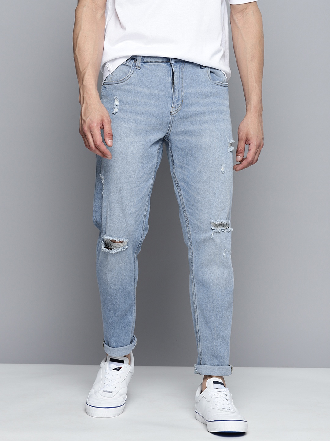 

Mast & Harbour Men Carrot Fit Mildly Distressed Light Fade Stretchable Jeans, Blue