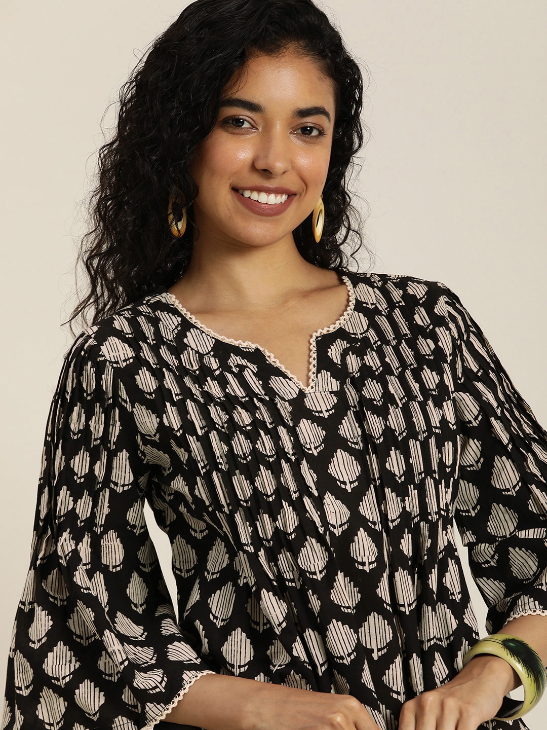 

Taavi Bagru Pure Cotton Ethic Motifs Printed Bell Sleeves Top, Black