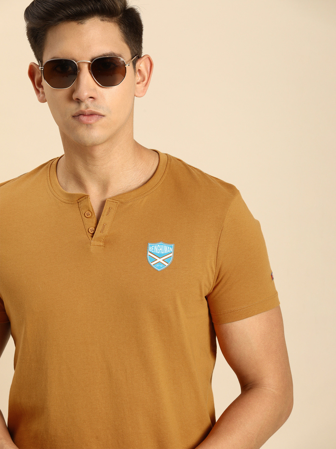 

Being Human Clothing Men Pure Cotton Henley Neck Applique T-shirt, Mustard