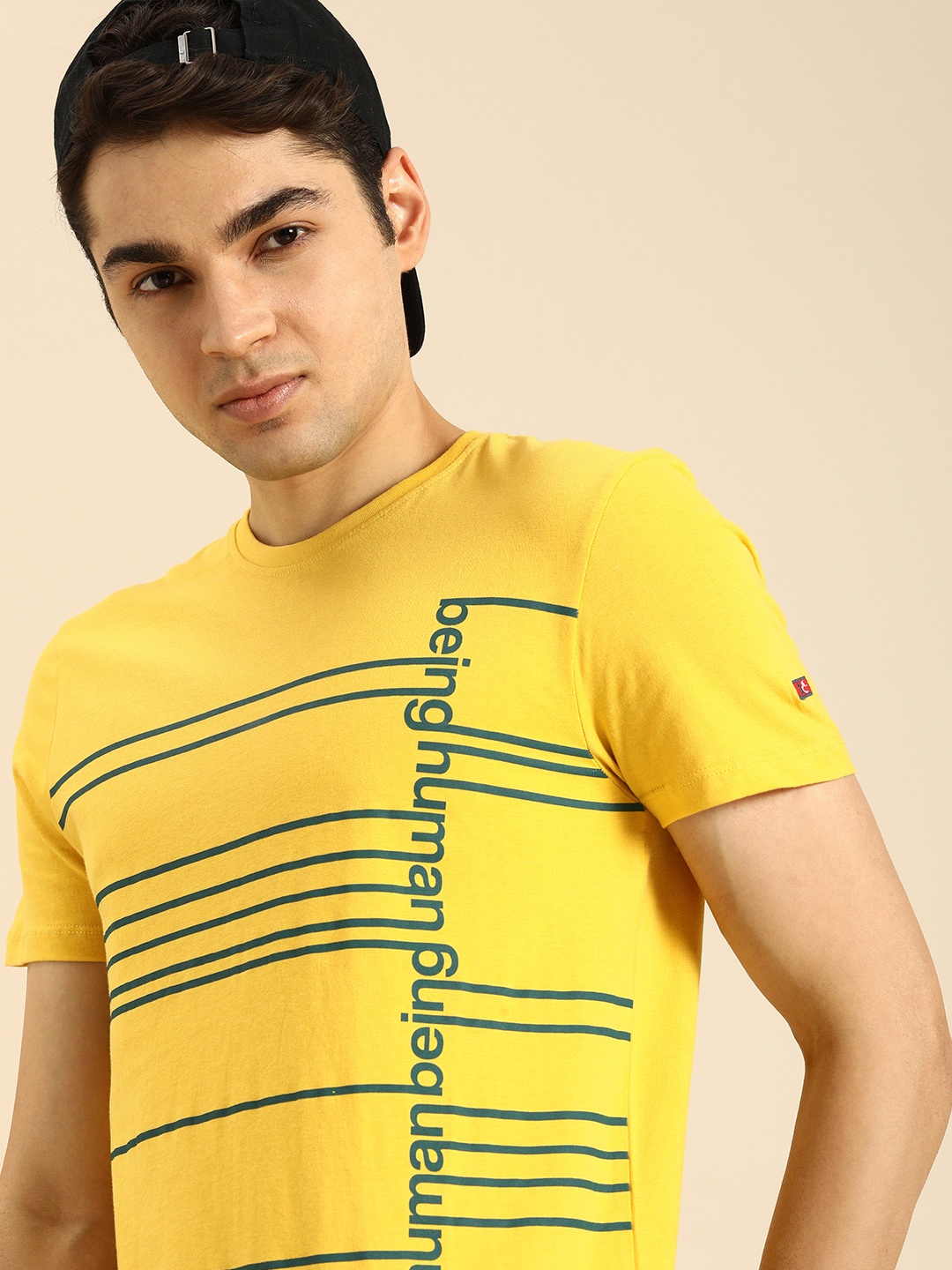 

Being Human Clothing Men Pure Cotton Brand Logo Printed Round Neck T-shirt, Yellow