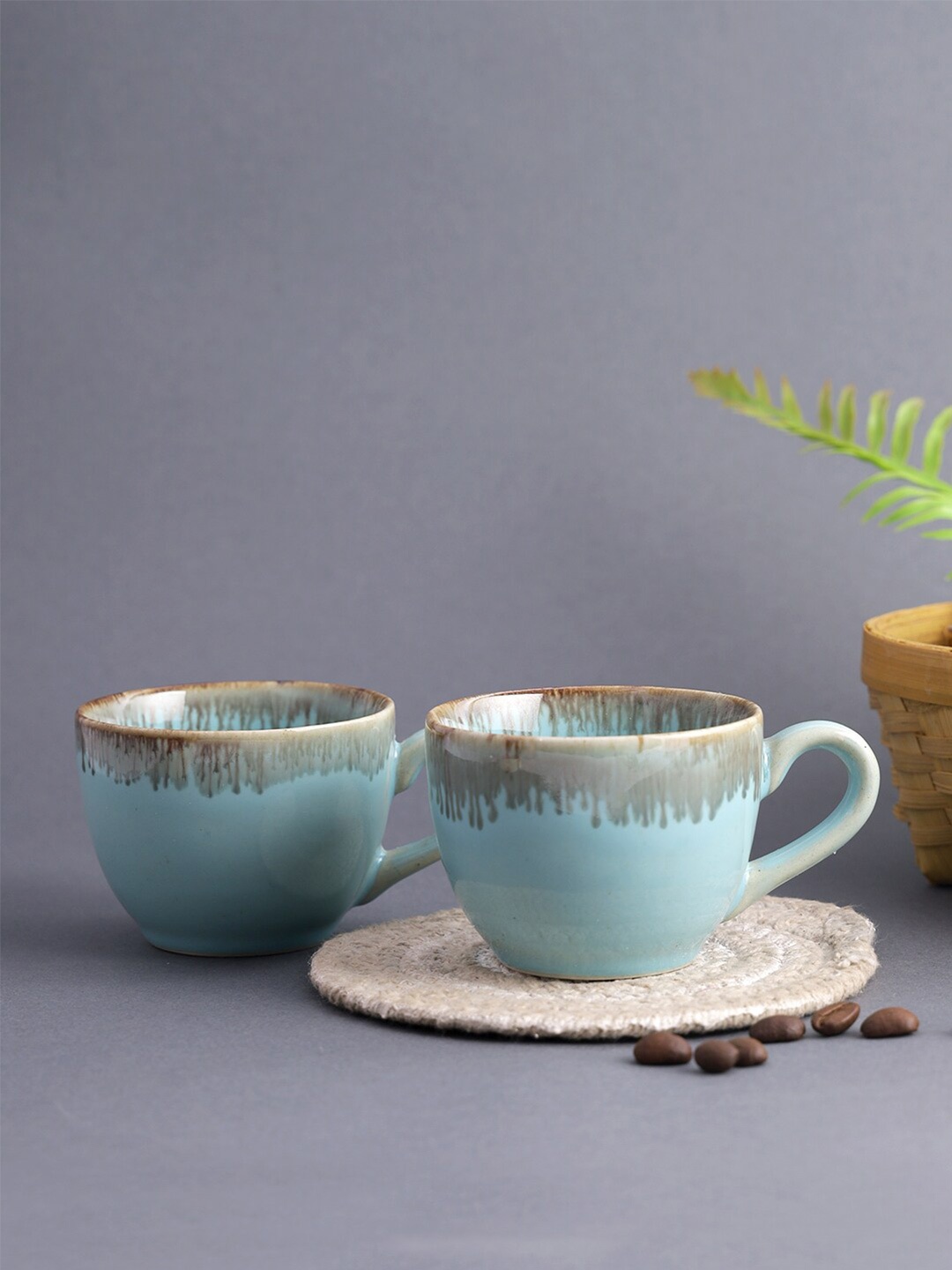 

Aapno Rajasthan Turquoise Blue & Brown Set Of 2 Microwave Safe Ceramic Mugs 280 ml Each