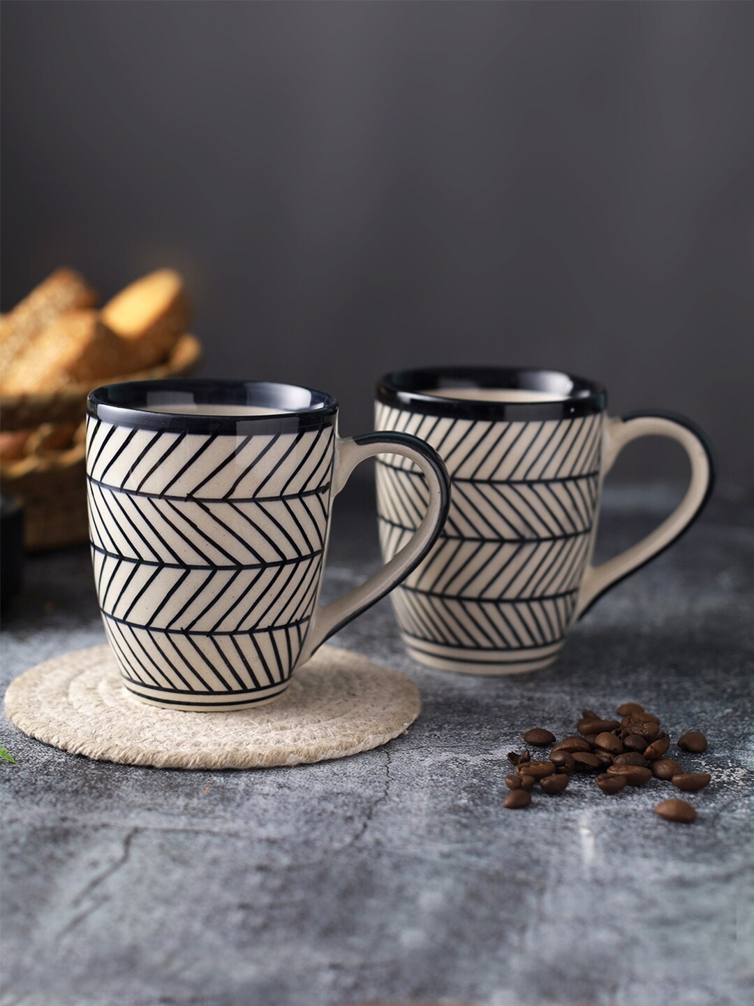 

Aapno Rajasthan Black & Beige Set Of 2 Microwave Safe Ceramic Coffee Mugs 280 ml Each