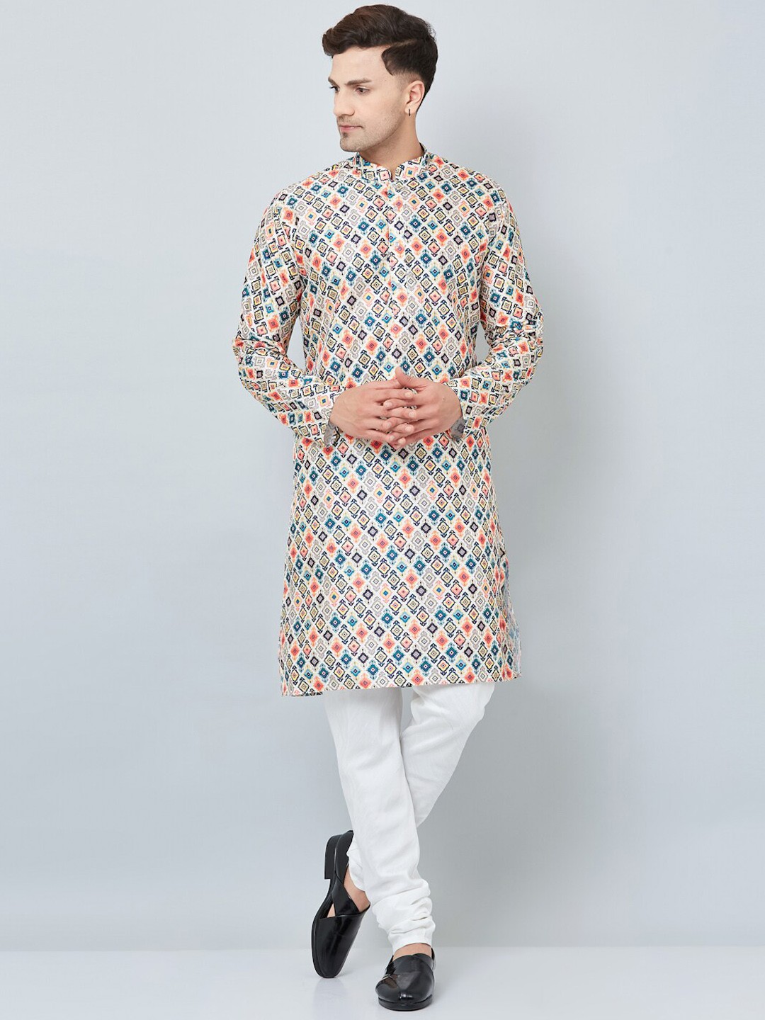 

Armaan Ethnic Men Beige Ethnic Motifs Printed Kurta with Churidar