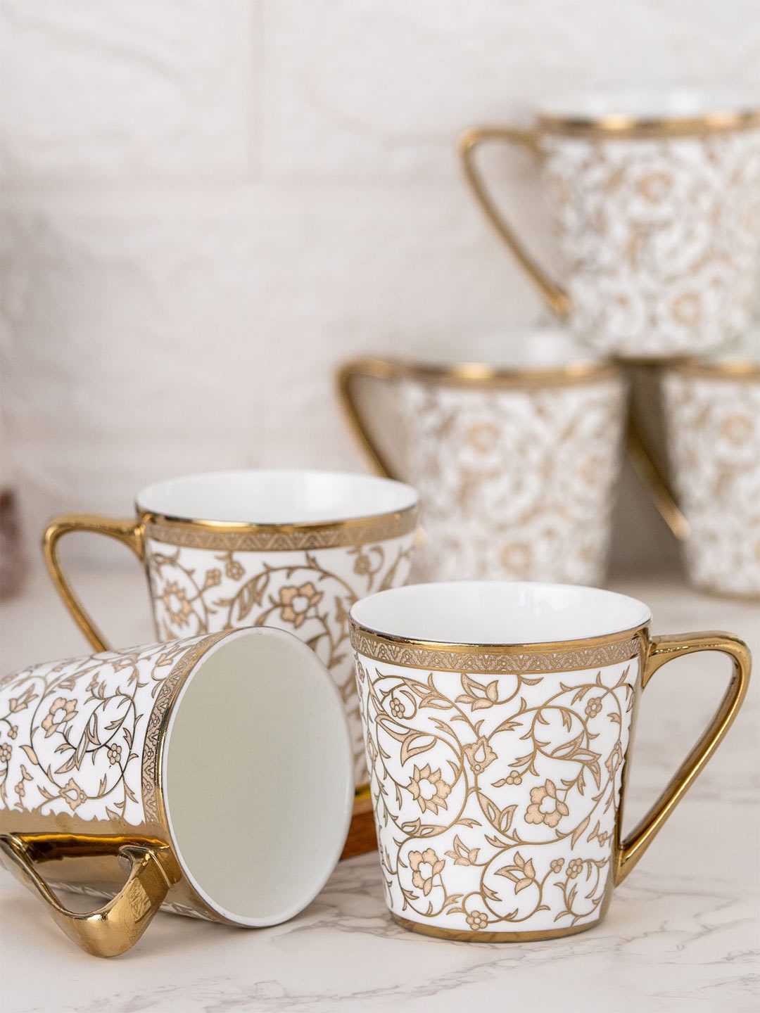 

CLAY CRAFT White & Gold-Toned Set of 6 Floral Printed Ceramic Glossy Cups - 180ml