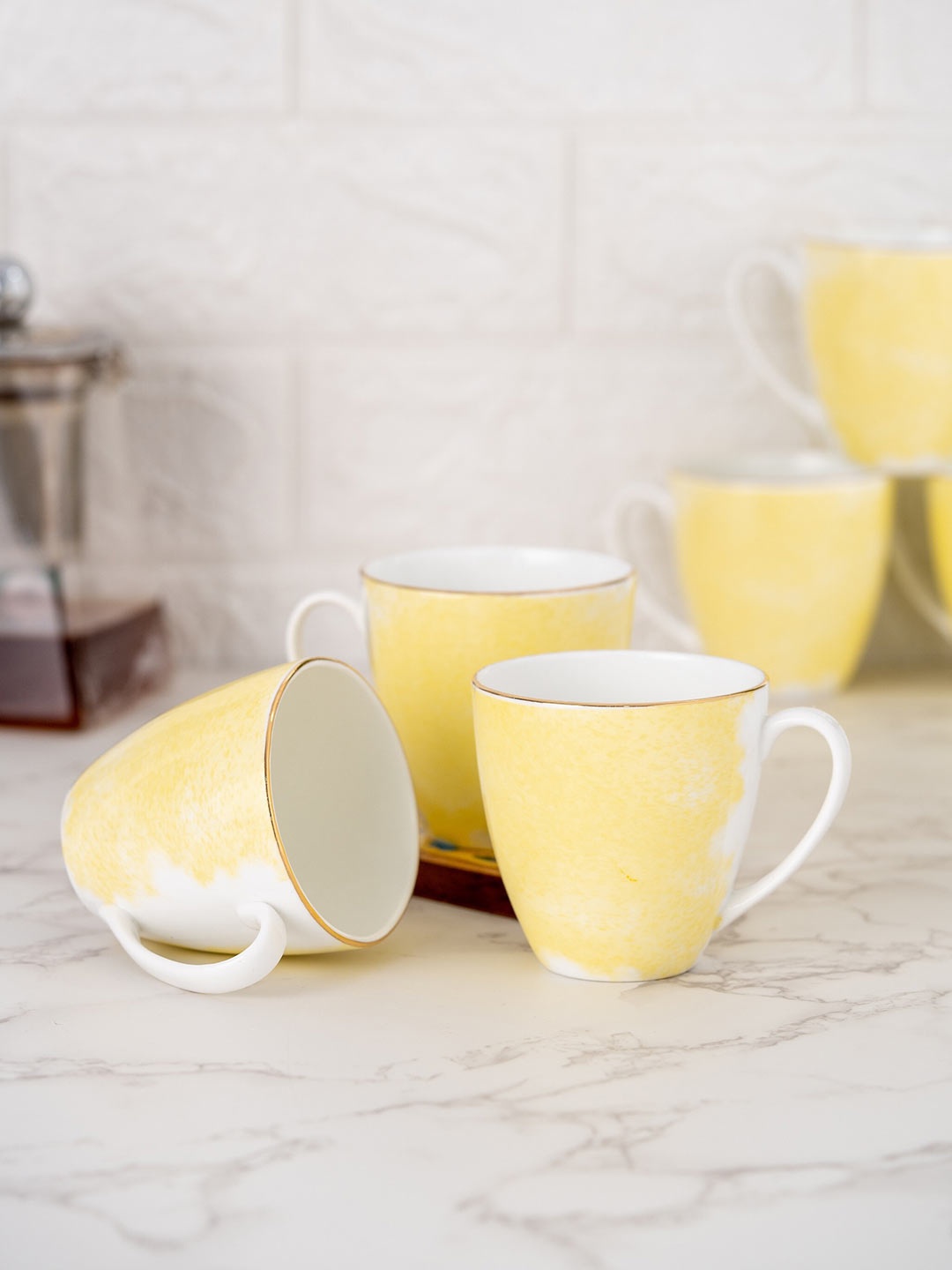 

CLAY CRAFT Yellow & White Set of 6 Printed Ceramic Glossy Cups - 180 ml