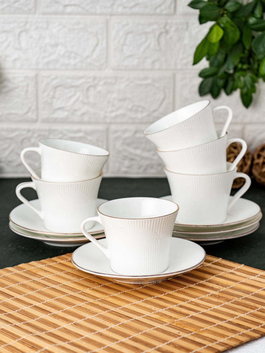 

CLAY CRAFT White & Gold-Toned 12 Pieces Printed Glossy Ceramic Cups and Saucers 180 ml