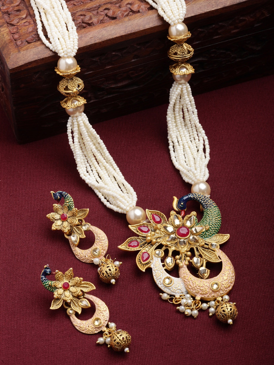 

PANASH Gold Plated & Off White Peacock Shaped Kundan Jewellery Set