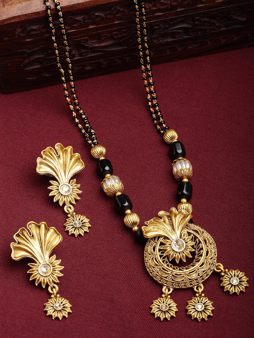 

PANASH Gold-Plated & White Stone-Studded & Black Beaded Mangalsutra