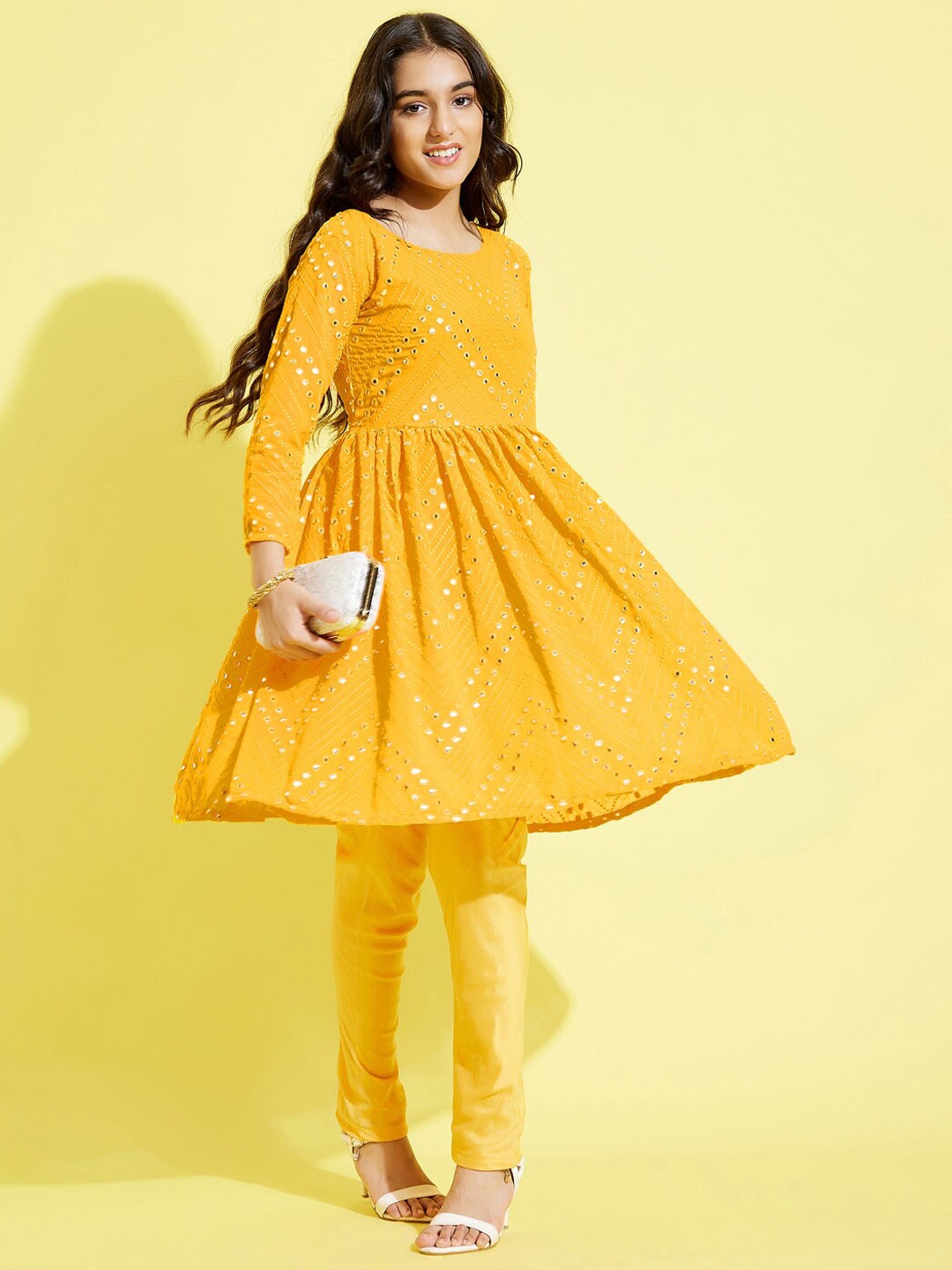 

VASTRAMAY Girls Yellow Embroidered Empire Mirror Work Kurti with Churidar