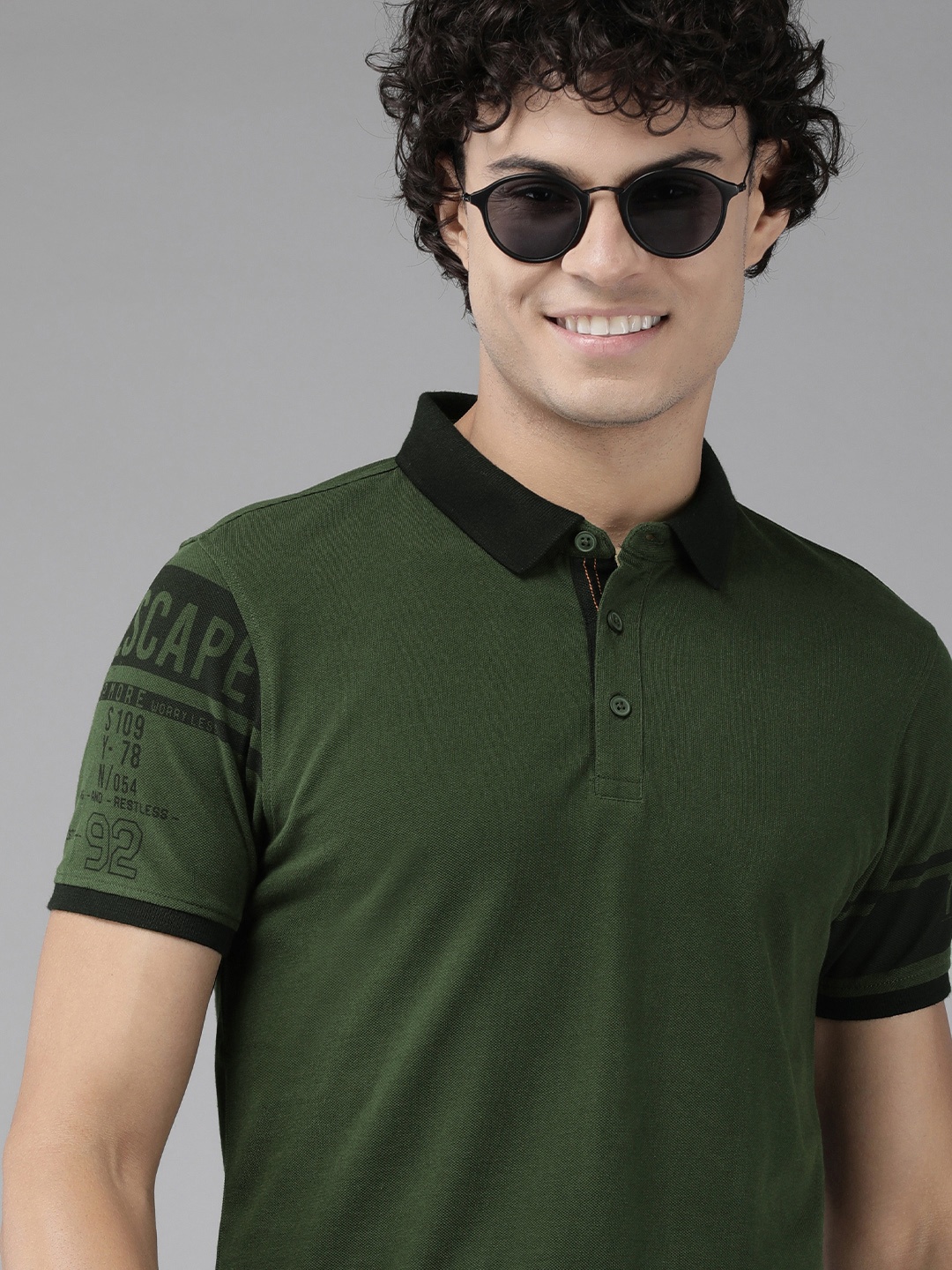 

SPYKAR Men Typography Printed Polo Collar Pure Cotton Slim Fit T-shirt, Olive