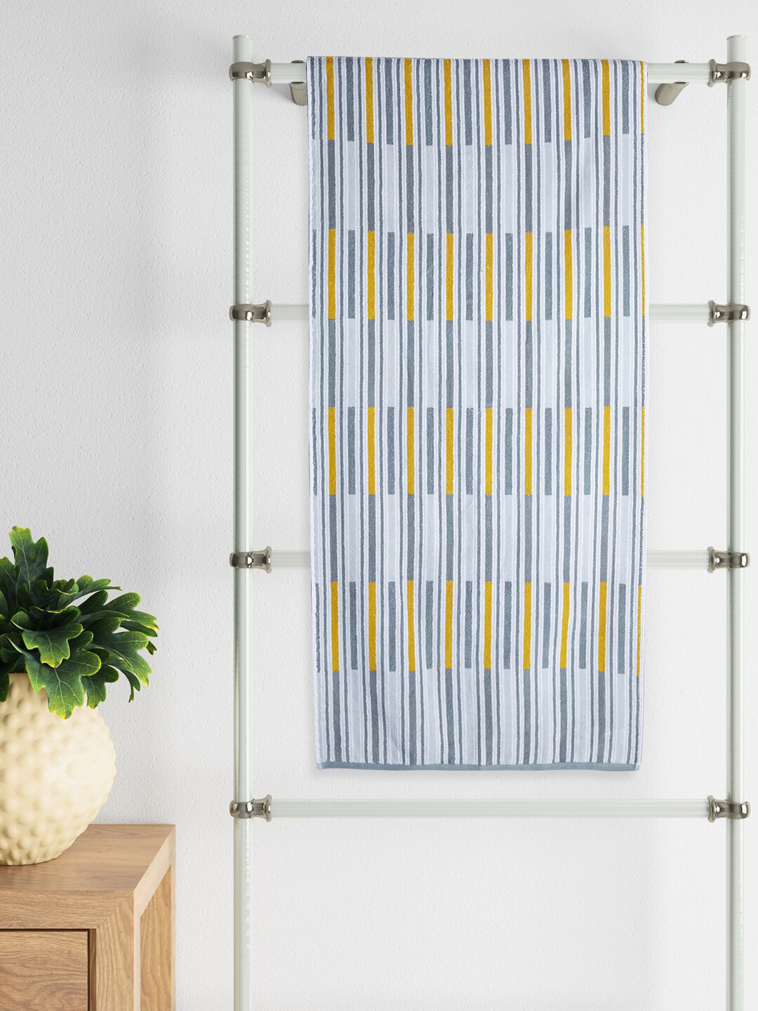 

Living scapes by Pantaloons Yellow & Grey Striped GSM 520 Cotton Bath Towel