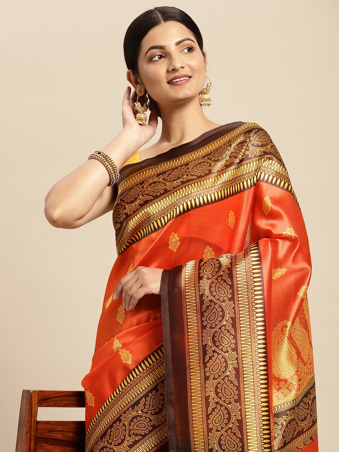 

SANGAM PRINTS Red & Golden Ethnic Motifs Print Saree