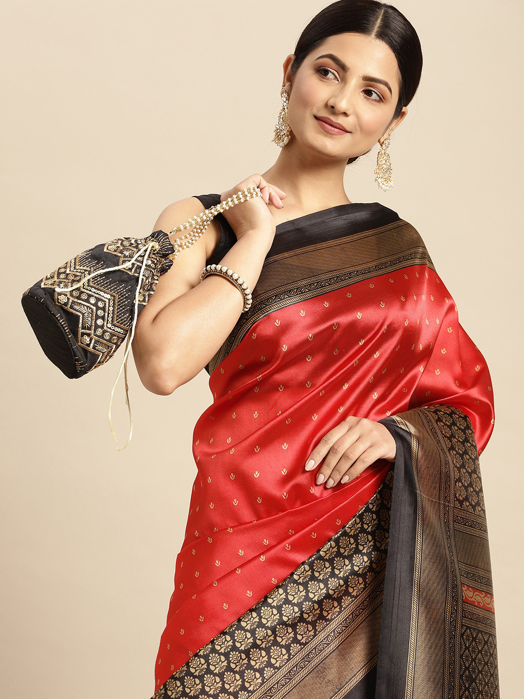 

SANGAM PRINTS Red Ethnic Motifs Print Saree