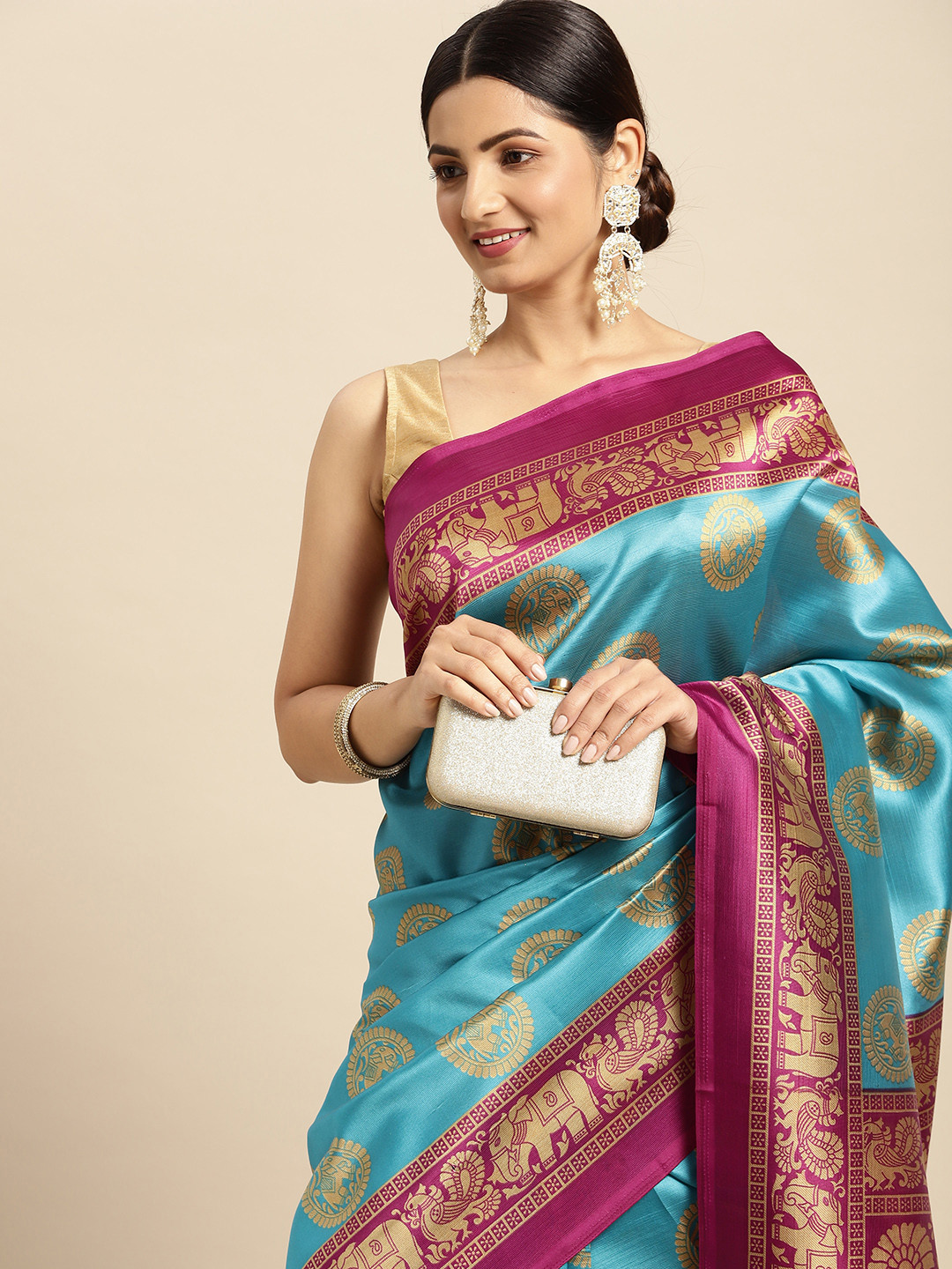 

SANGAM PRINTS Blue & Golden Ethnic Motifs Print Saree
