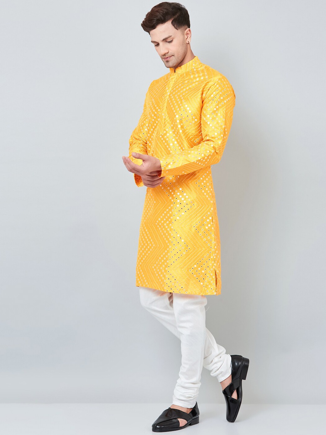 

Armaan Ethnic Men Yellow Embroidered Mirror Work Dupion Silk Kurta with Churidar