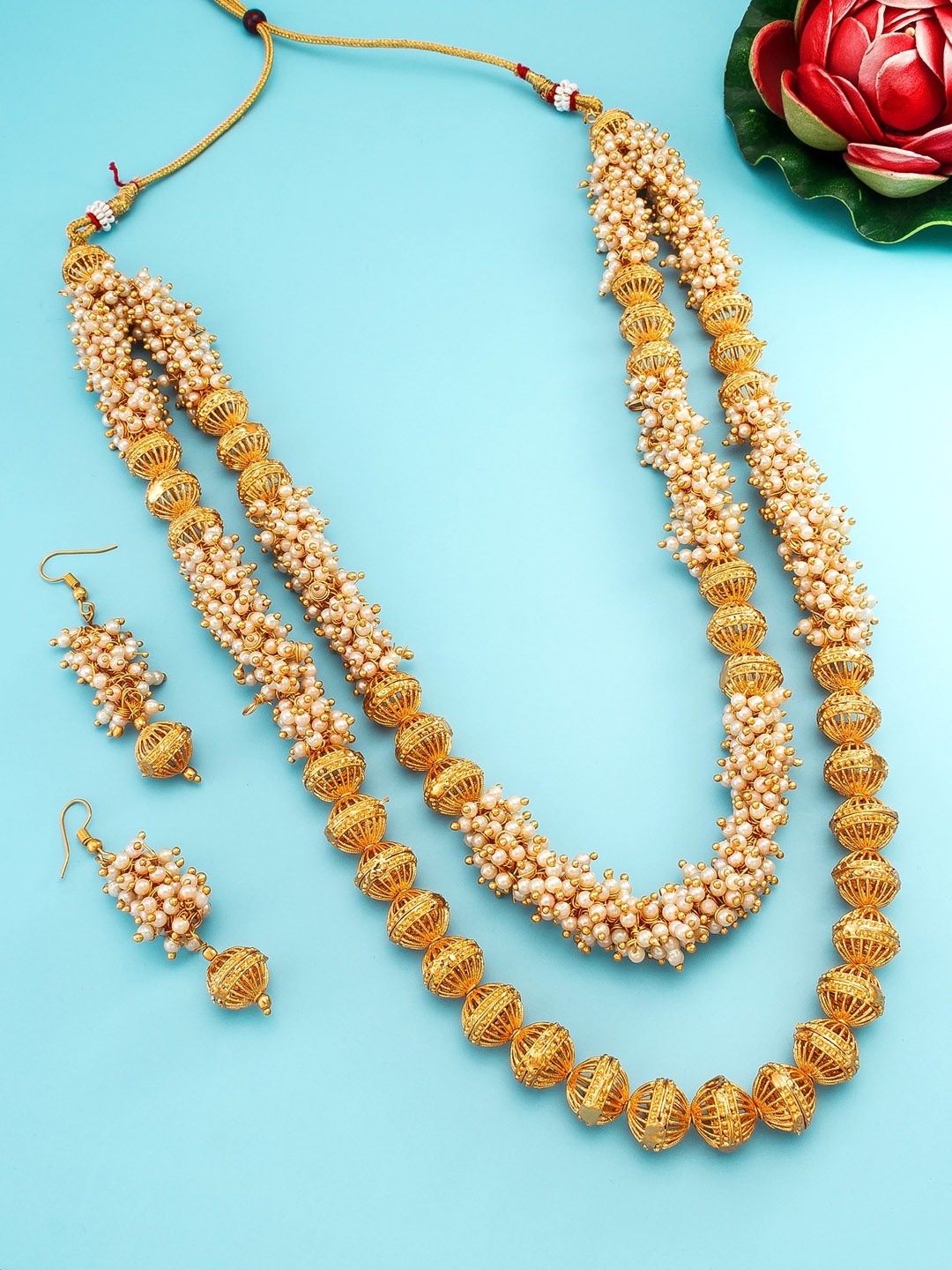 

aadita Gold-Plated Pearls studded Jewellery Set
