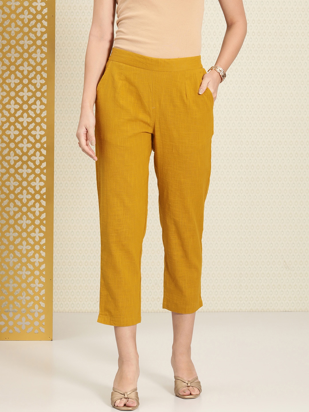 

House of Pataudi Women Self Design Pure Cotton Elasticated Cropped Ethnic Trousers, Mustard