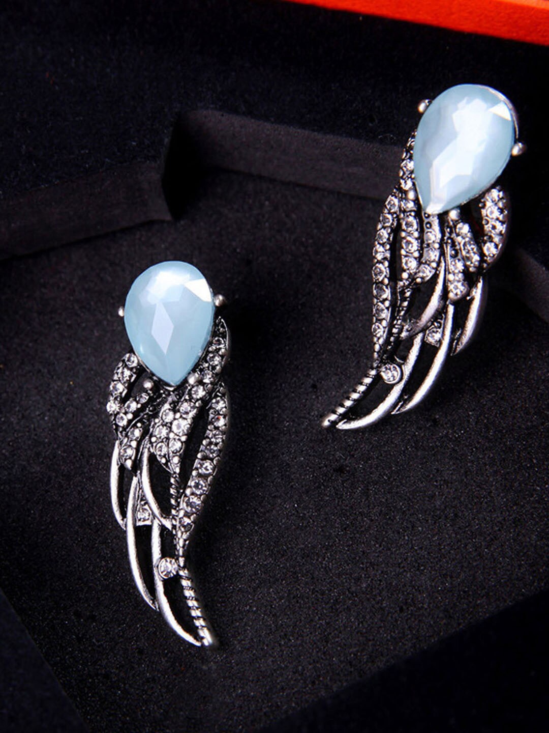 

Young & Forever Blue & Silver-Plated Cubic Zirconia Leaf Shaped Studs Earrings