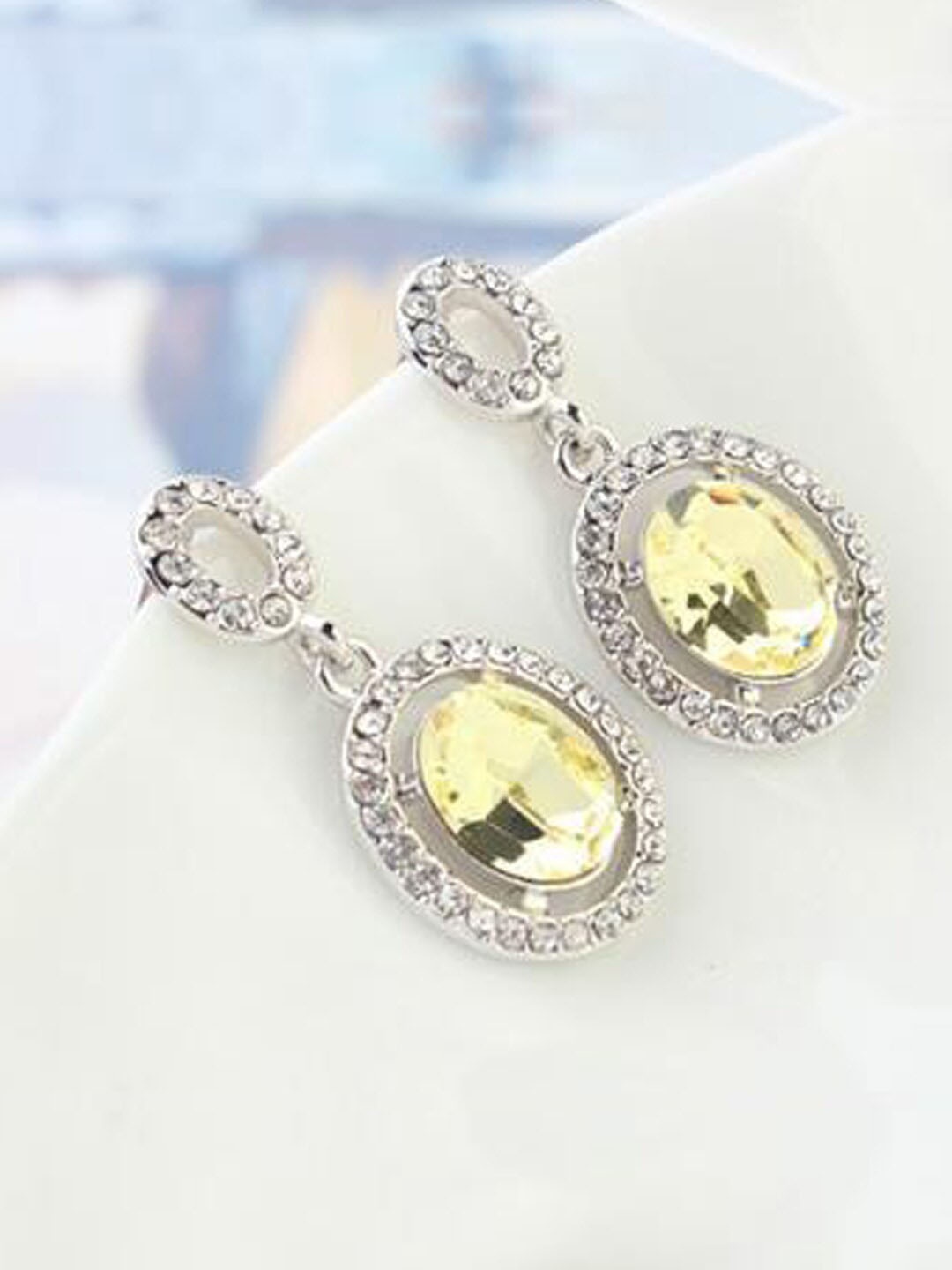 

Young & Forever Yellow Silver-Plated Crystals Oval Drop Earrings