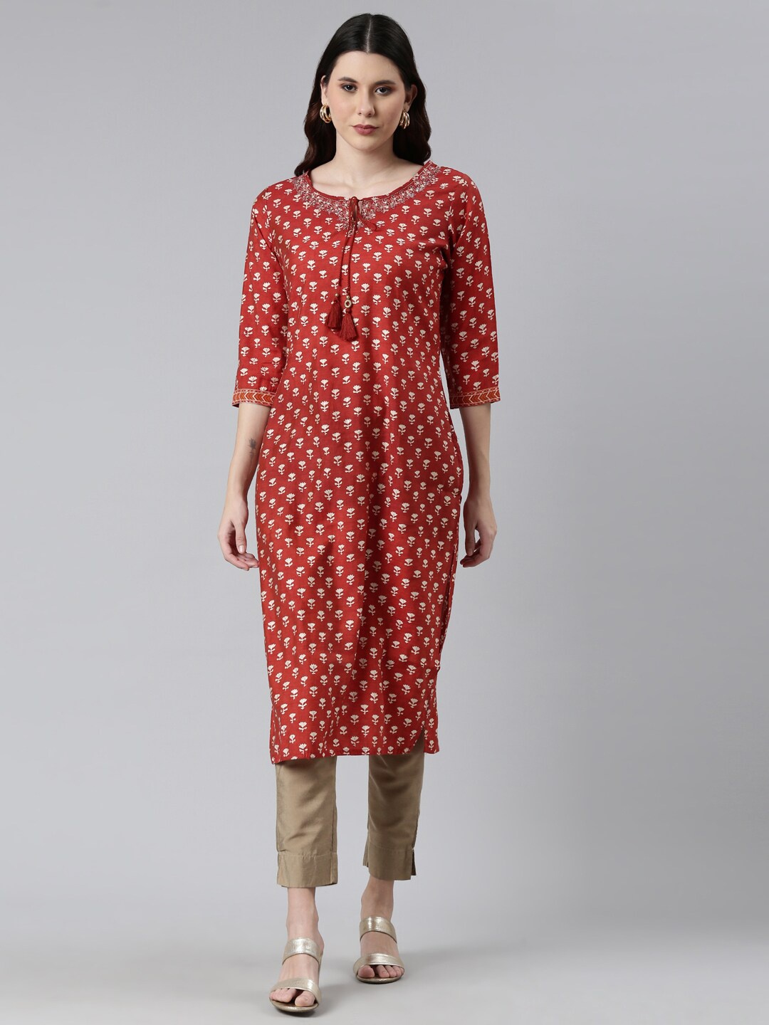 

Neerus Women Rust Ethnic Motifs Printed Mirror Work Kurta