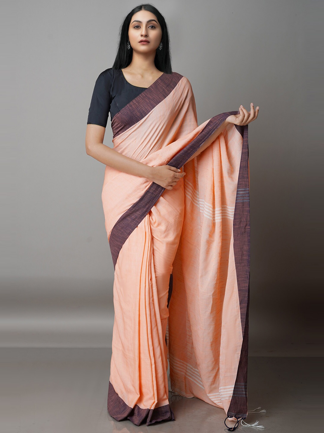 

Unnati Silks Peach-Coloured Jamdani Saree