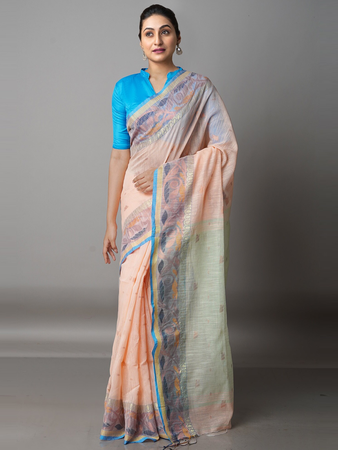 

Unnati Silks Peach-Coloured & Blue Floral Zari Silk Cotton Jamdani Saree
