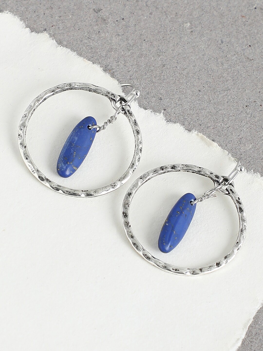 

SOHI Blue & Silver-Plated Contemporary Drop Earrings