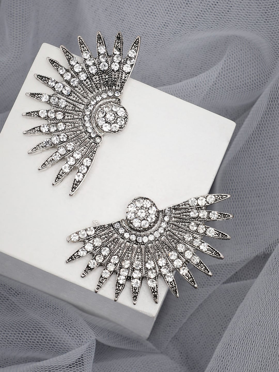 

SOHI Silver-Plated Contemporary Studs Earrings