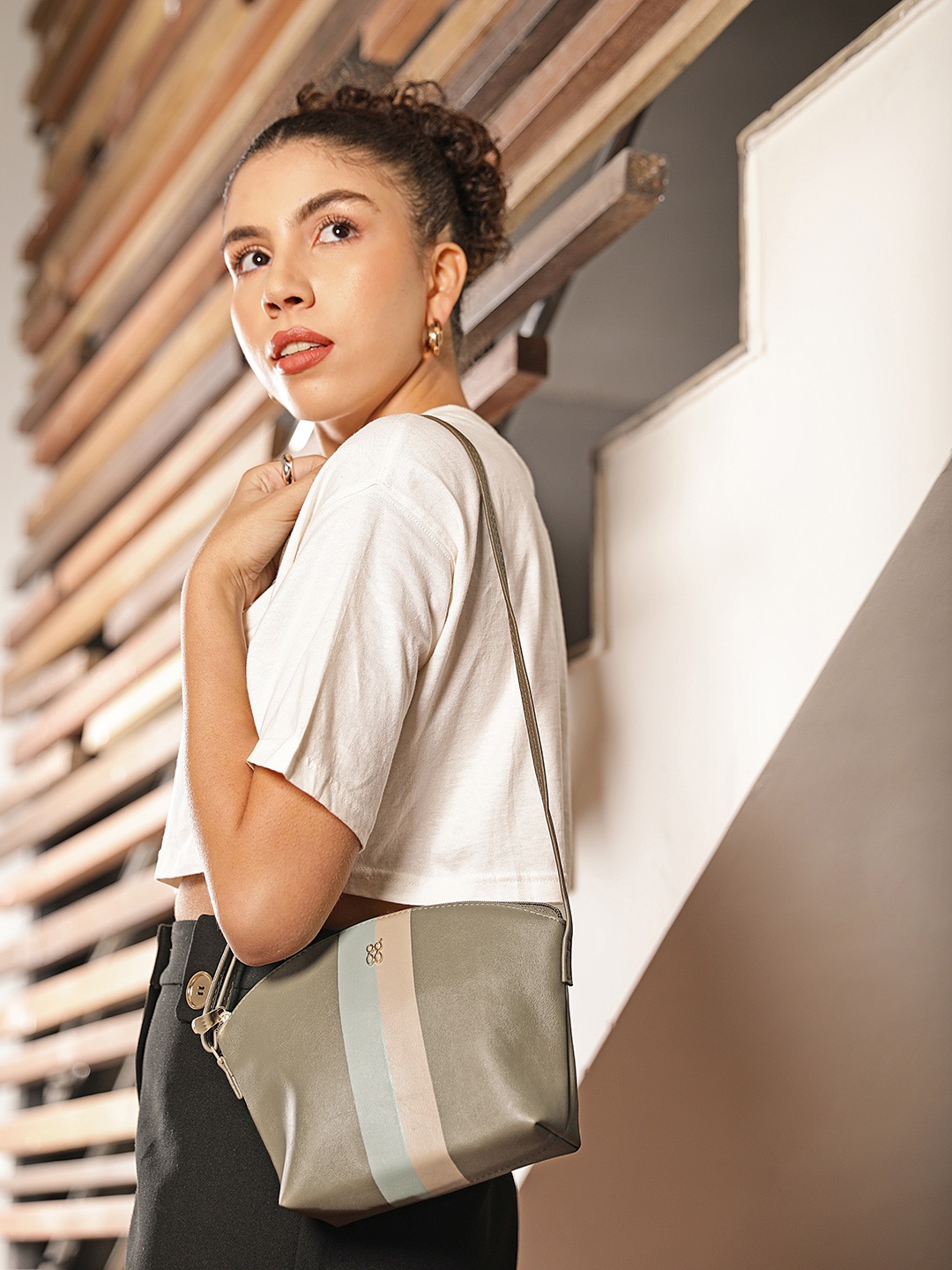 

Baggit Green Striped Sling Bag