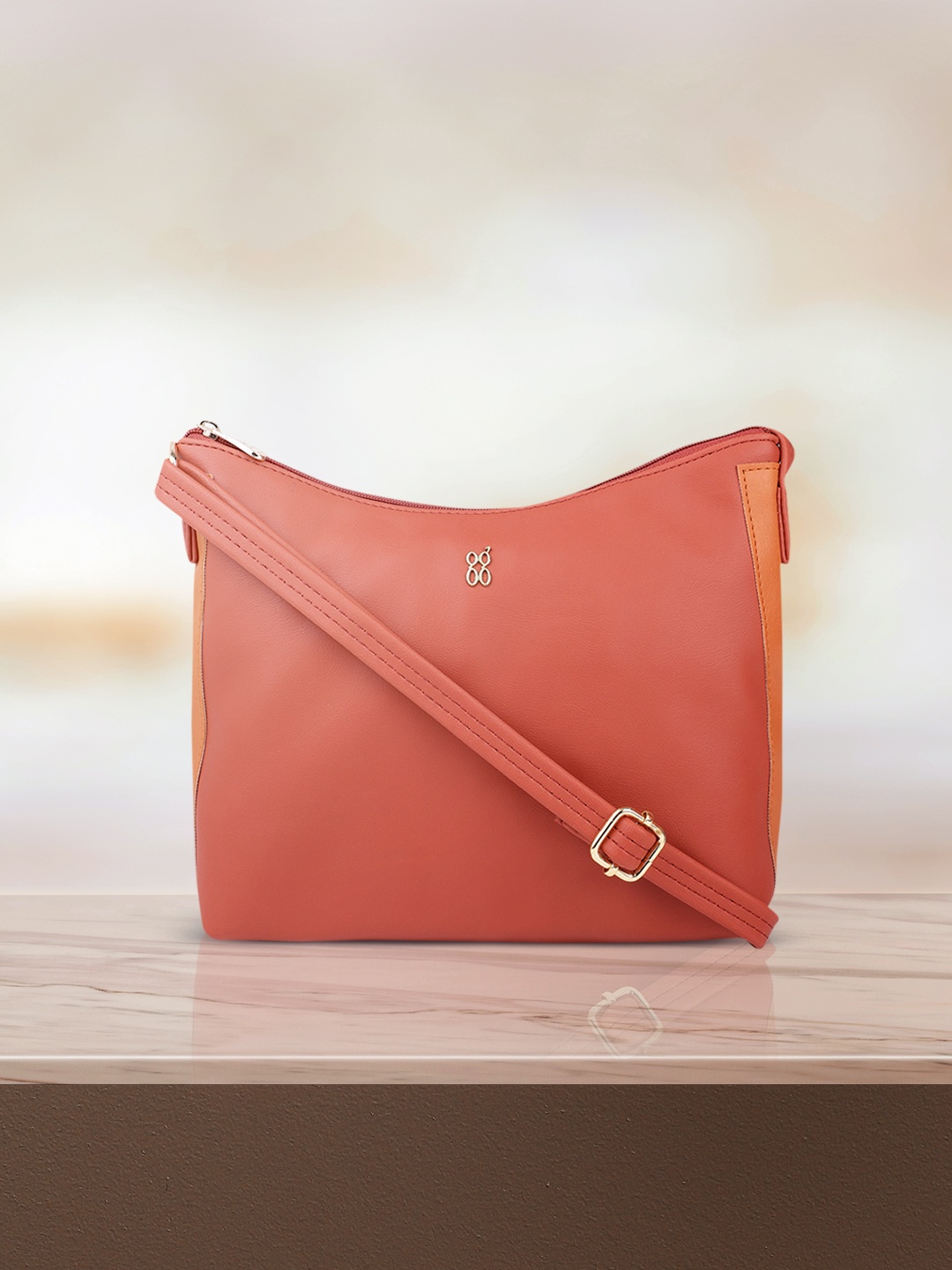 

Baggit Women Rust Solid Structured Sling Bag