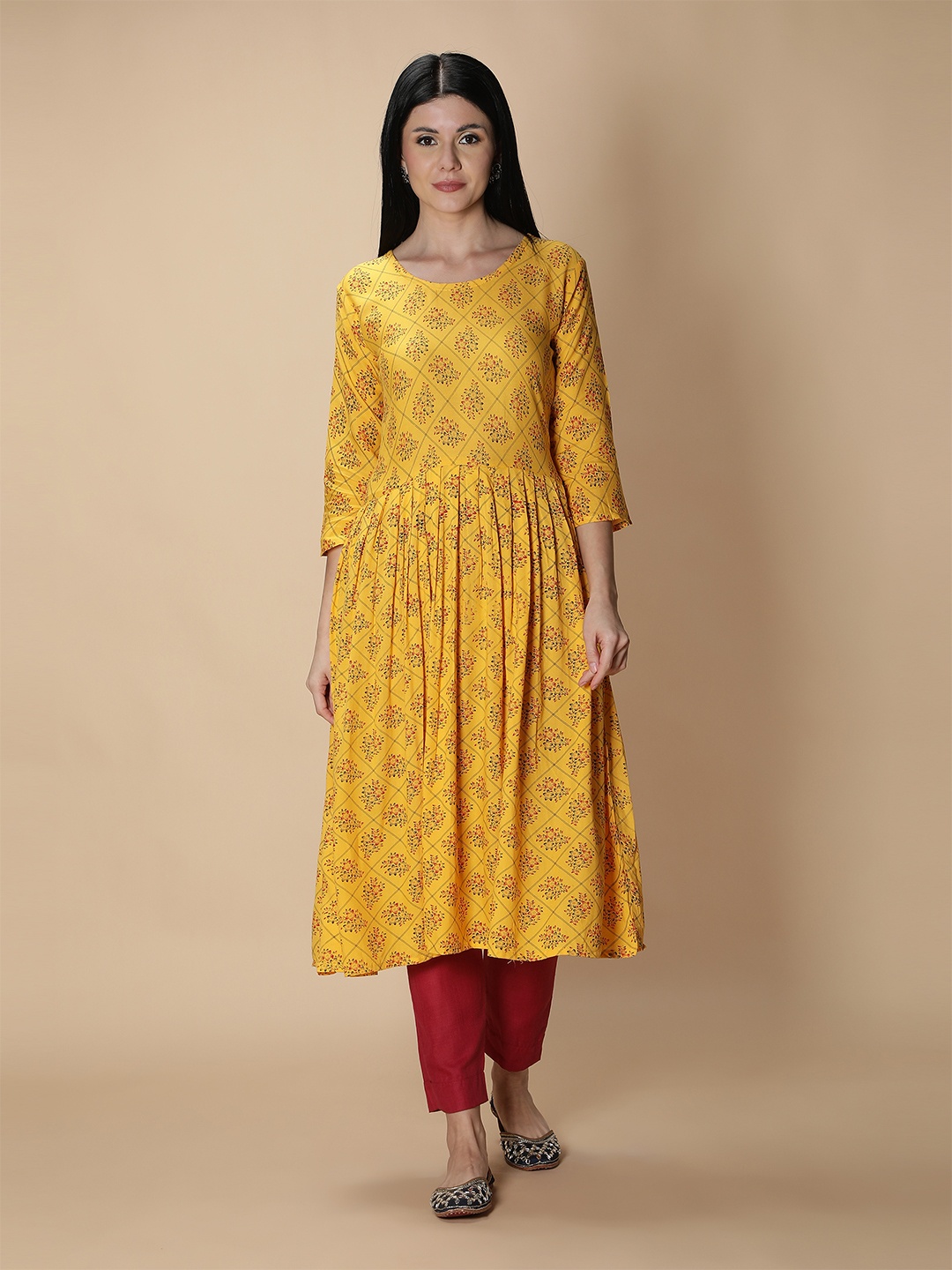 

Fabclub Women Yellow Ethnic Motifs Printed Anarkali Kurta