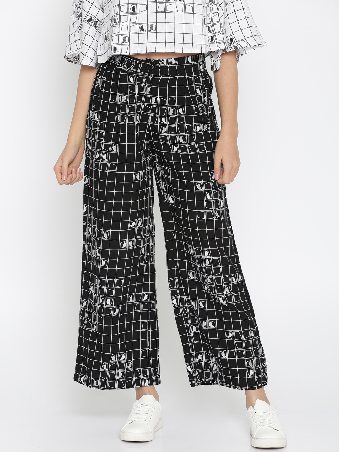 

Global Desi Women Black & White Printed Regular Trousers