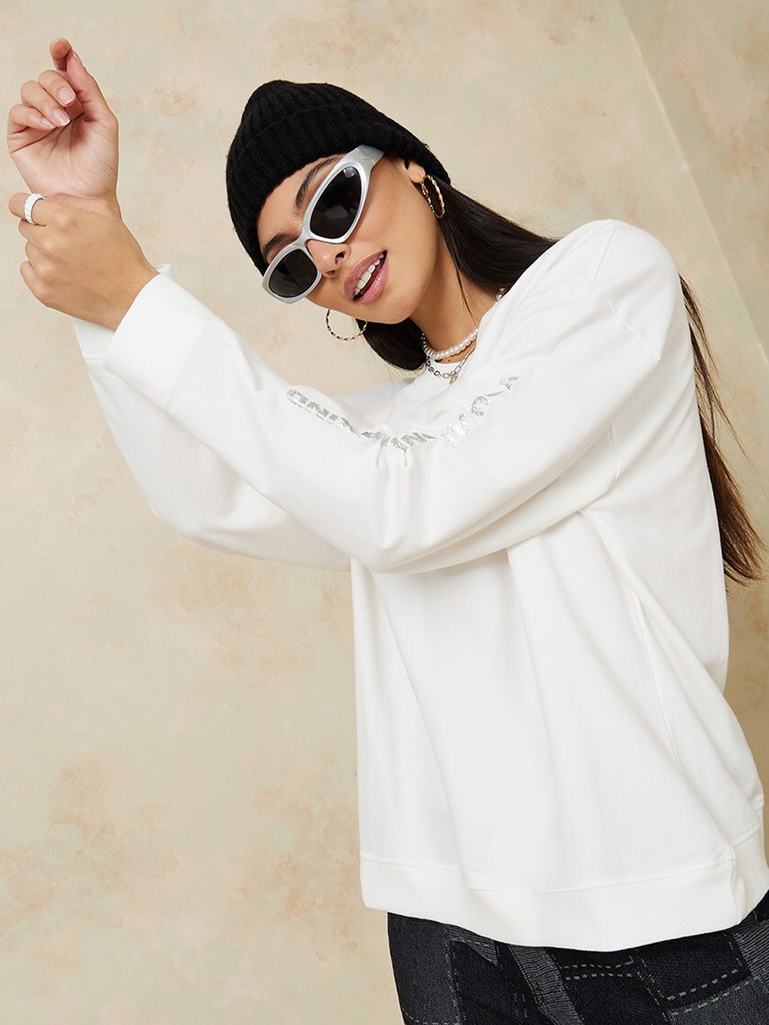 

Styli Women Off White Solid Sweatshirt