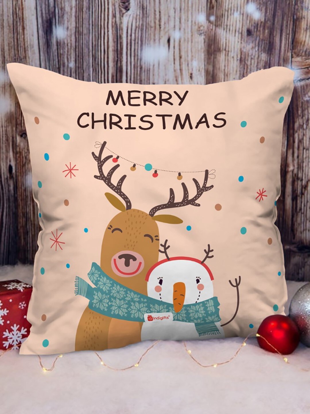 

Indigifts Peach & Brown Reindeer and Snowman Printed Square Cushion with Filler