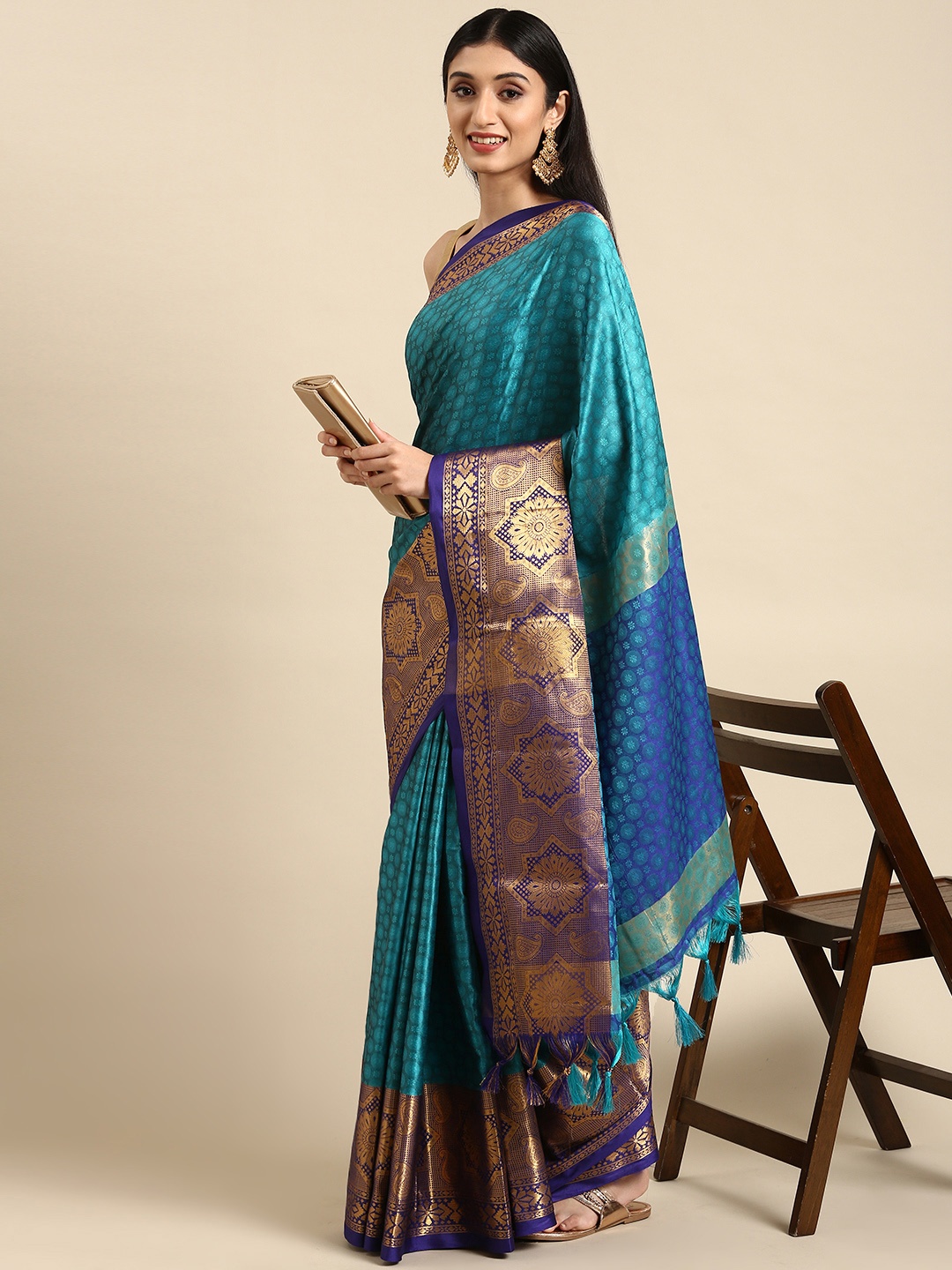 

Anouk Blue & Golden Woven Design Silk Blend Banarasi Saree