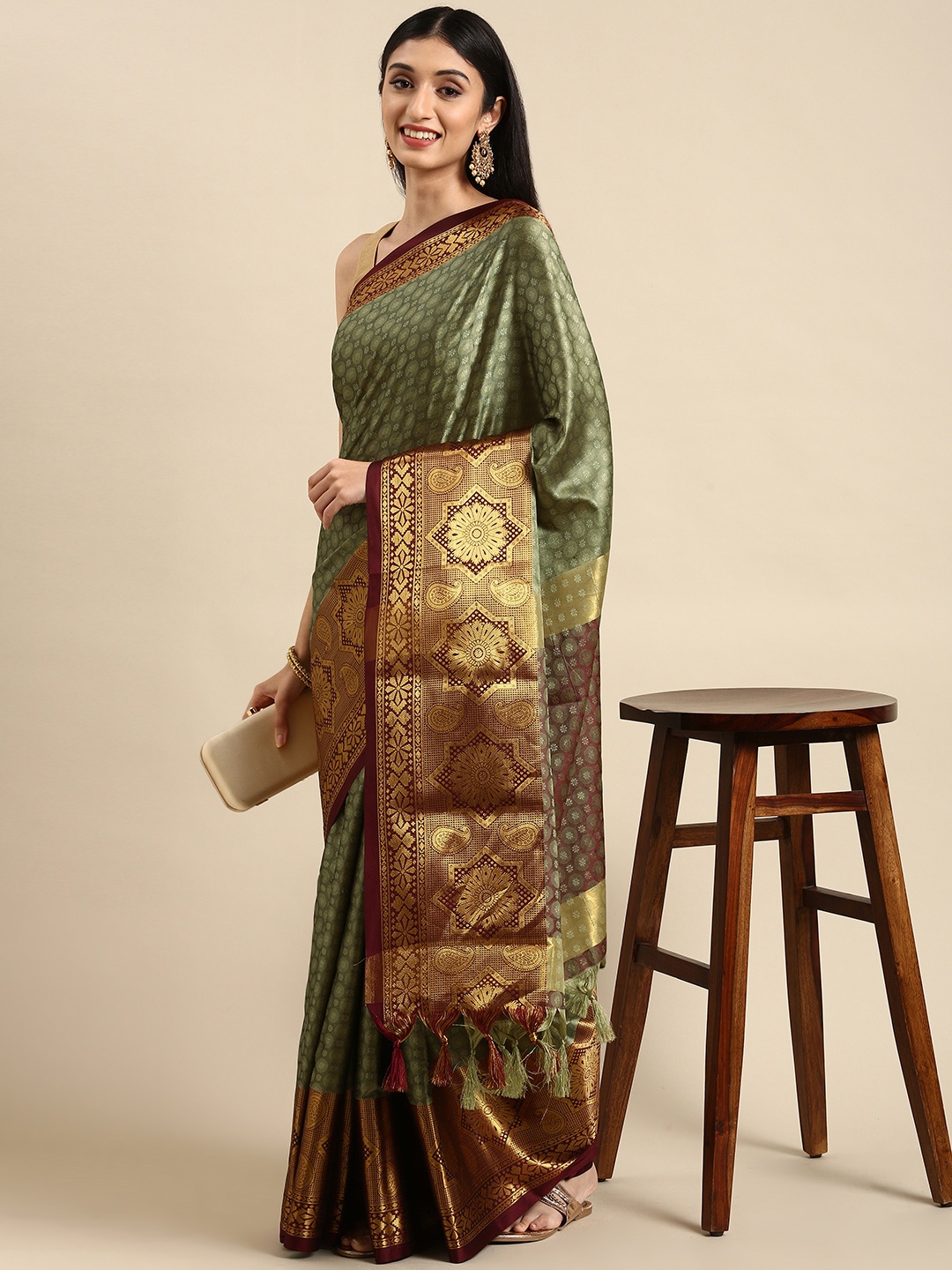 

Anouk Green & Maroon Woven Design Silk Blend Banarasi Saree