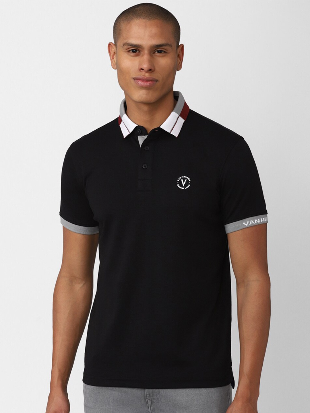 

VAN HEUSEN DENIM LABS Men Black Solid Polo Collar T-shirt