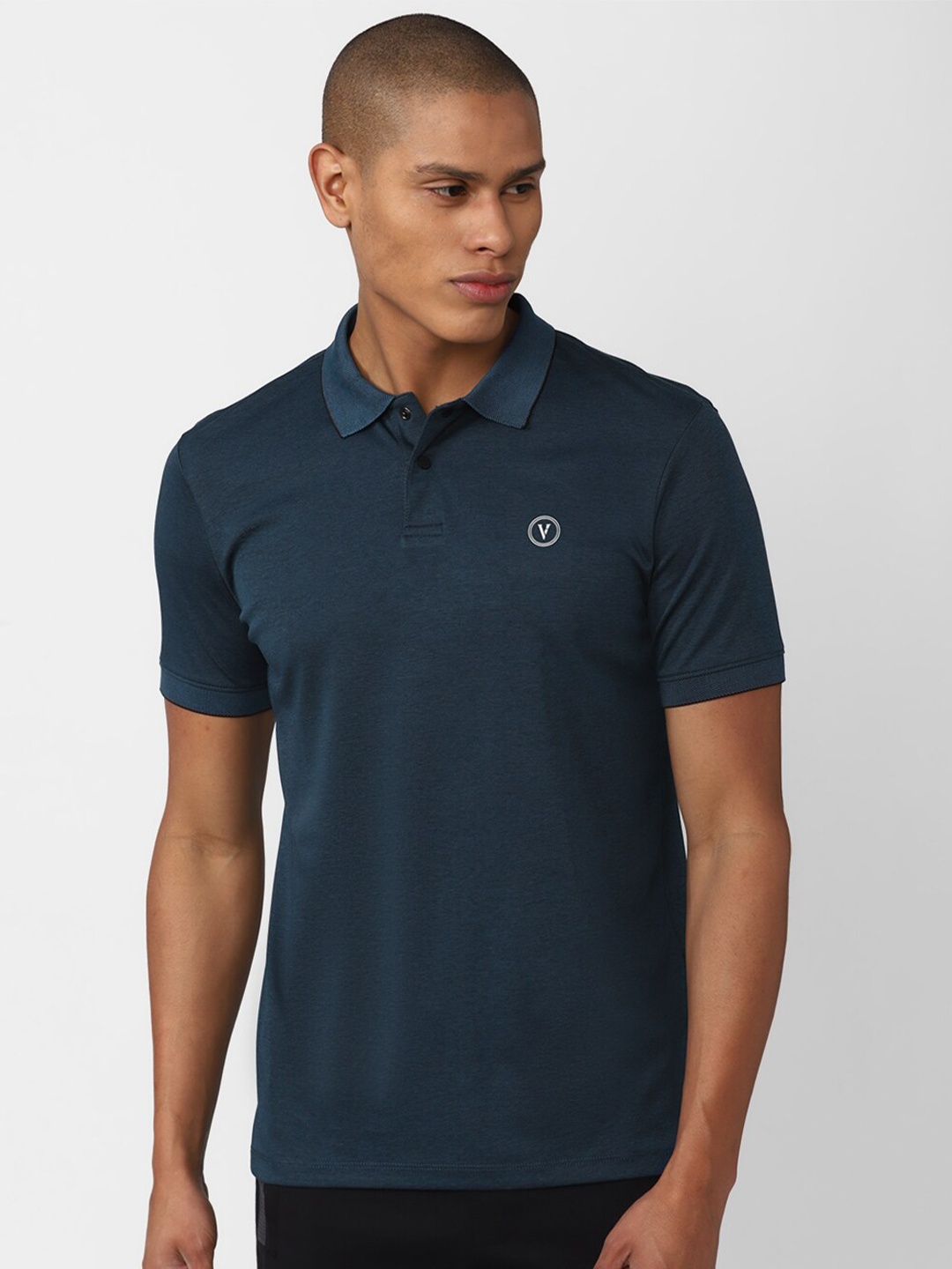 

Van Heusen Flex Men Navy Blue Solid Polo Collar T-shirt
