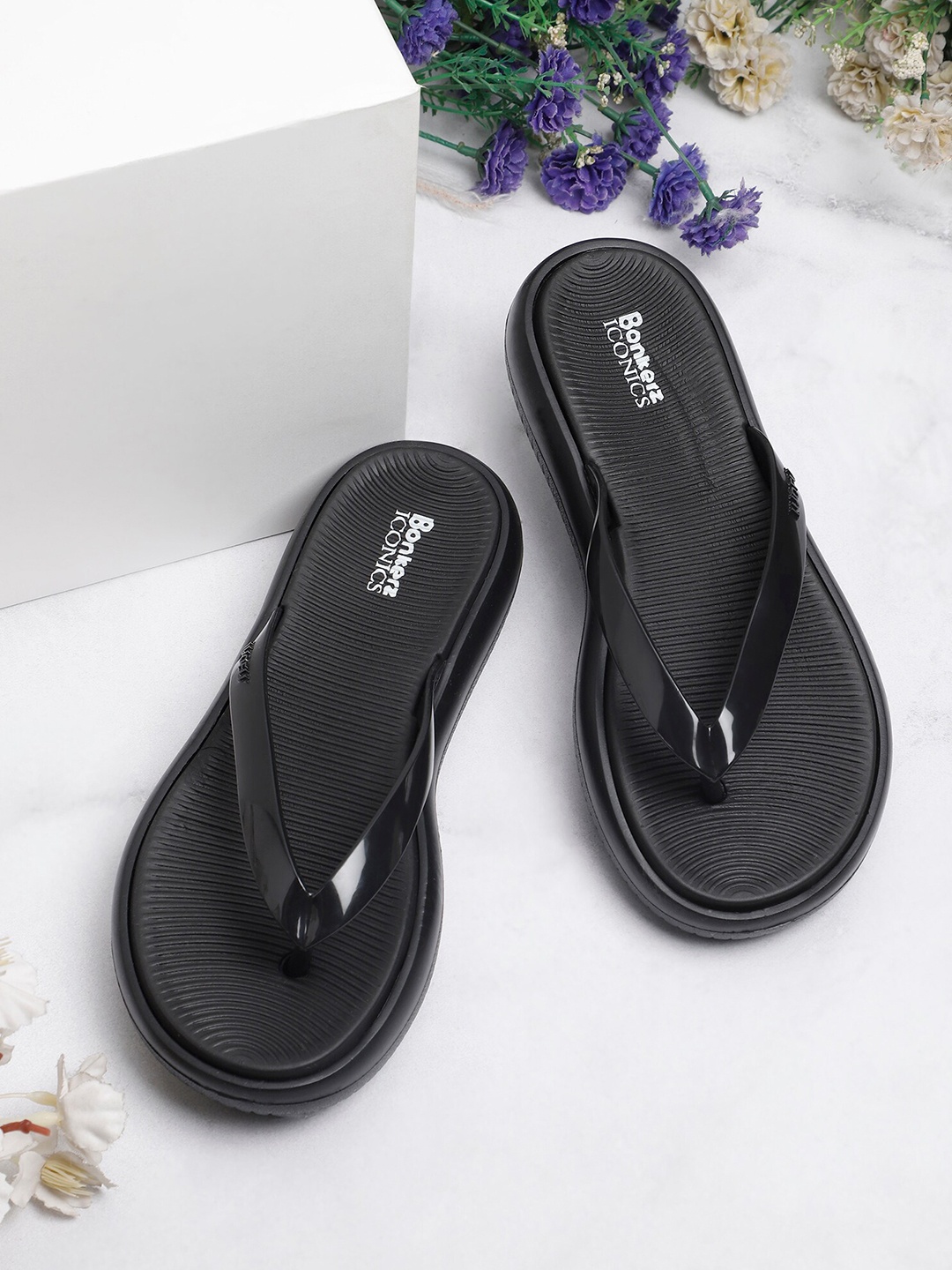 

ICONICS Women Black & White Croslite Thong Flip-Flops